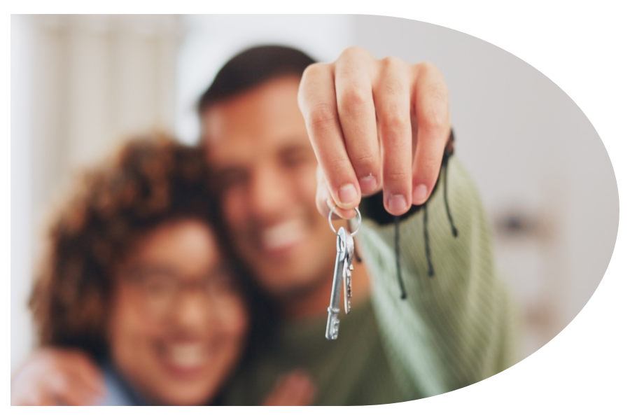 Couple holding house keys